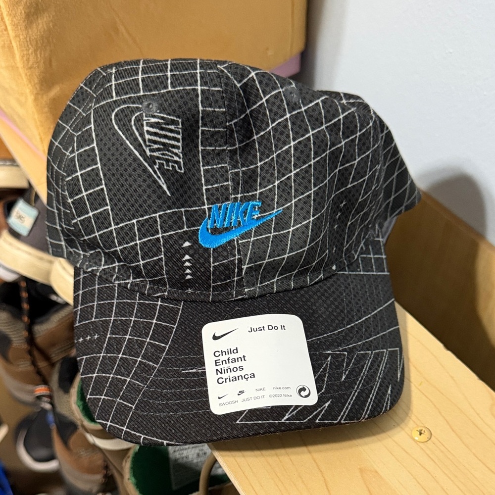Nike Black Cap with Blue Logo and Grid Pattern